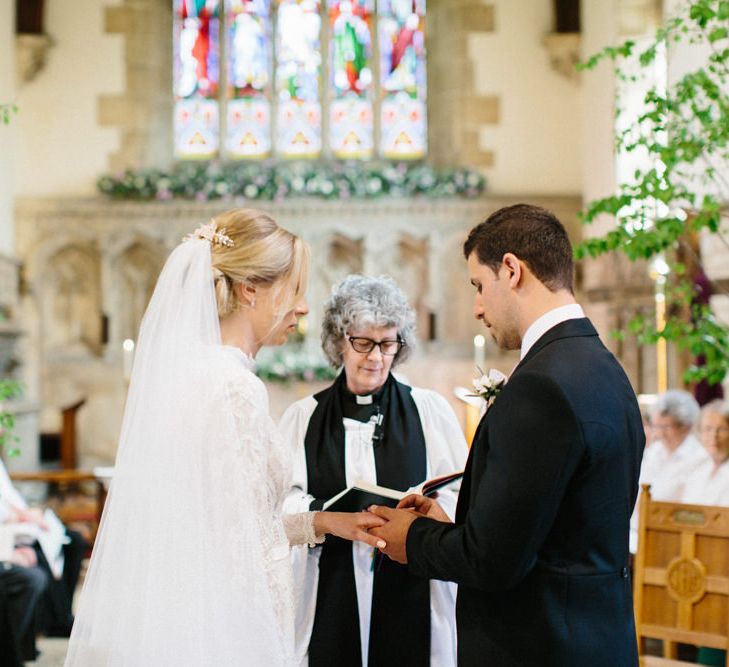 Lilac and white floral aisle runner | Silver Birch trees | Papakata Sperry Tent Wedding at family home | Sassi Holford Dress with added ivory Ostrich feathers to veil | Manolo Blahnik shoes | Images by Melissa Beattie