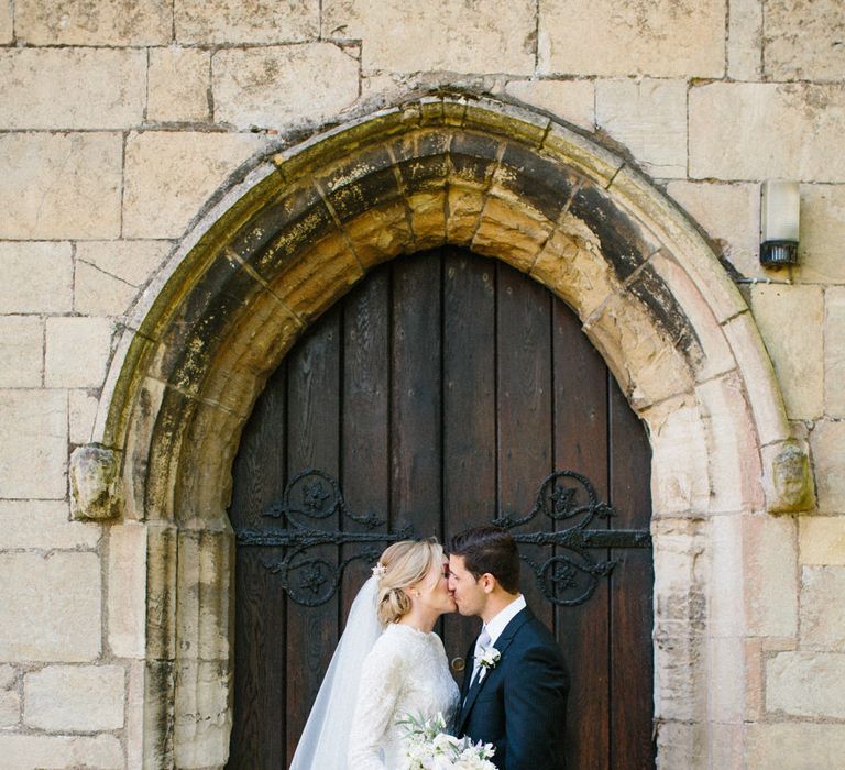 Papakata Sperry Tent Wedding at family home | Sassi Holford Dress with added ivory Ostrich feathers to veil | Manolo Blahnik shoes | Images by Melissa Beattie