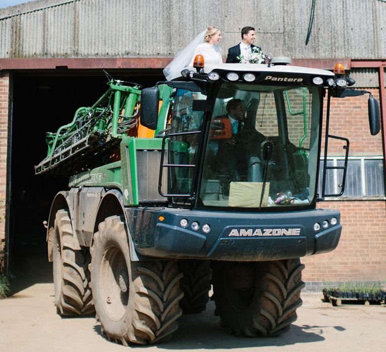 Farm wedding tractor ride | Papakata Sperry Tent Wedding at family home | Sassi Holford Dress with added ivory Ostrich feathers to veil | Manolo Blahnik shoes | Images by Melissa Beattie