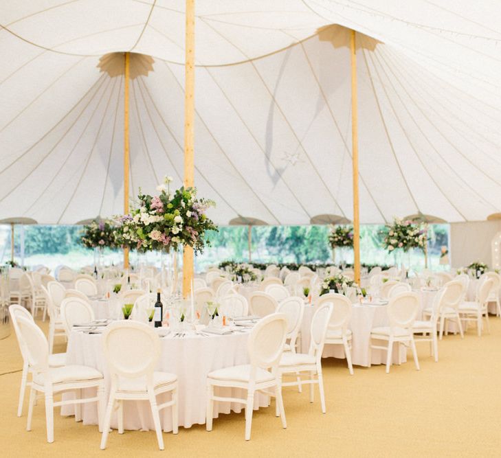 Papakata Sperry Tent Wedding at family home | Sassi Holford Dress with added ivory Ostrich feathers to veil | Manolo Blahnik shoes | Images by Melissa Beattie