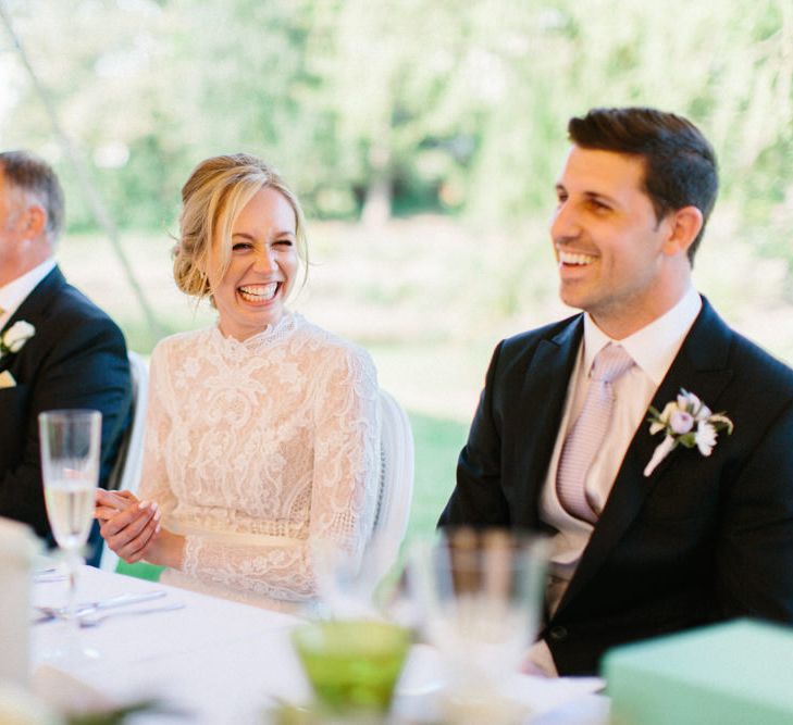 Papakata Sperry Tent Wedding at family home | Sassi Holford Dress with added ivory Ostrich feathers to veil | Manolo Blahnik shoes | Images by Melissa Beattie