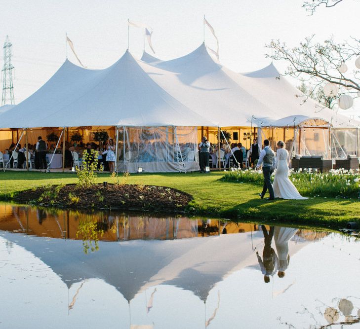 Garden Wedding | Papakata Sperry Tent Wedding at family home | Sassi Holford Dress with added ivory Ostrich feathers to veil | Manolo Blahnik shoes | Images by Melissa Beattie