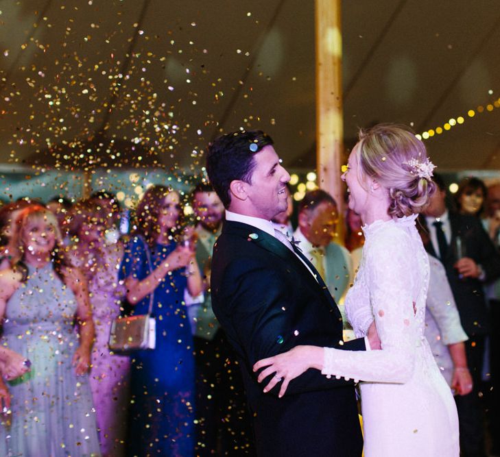 Papakata Sperry Tent Wedding at family home | Sassi Holford Dress with added ivory Ostrich feathers to veil | Manolo Blahnik shoes | Images by Melissa Beattie