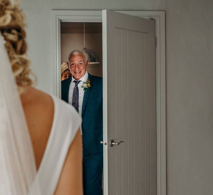 Bride's father sees her for the first time in wedding dress