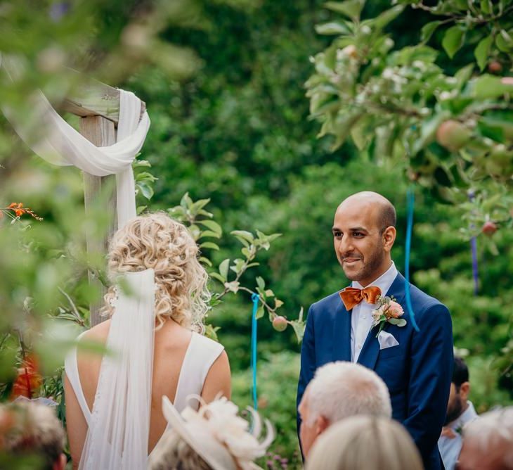 Outdoor ceremony with bright wedding decorations