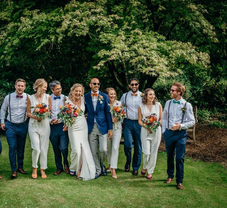 Wedding party with bright flowers and bowties