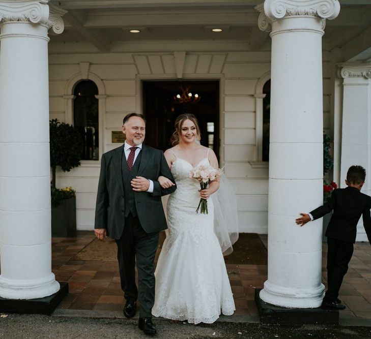 Father of the bride and daughter  in Morilee wedding dress and