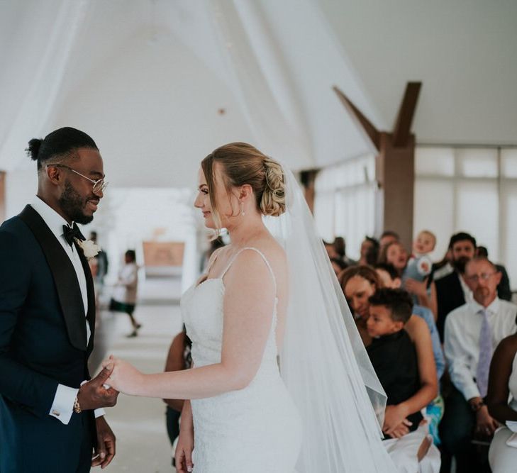 Bride and groom exchanging vows