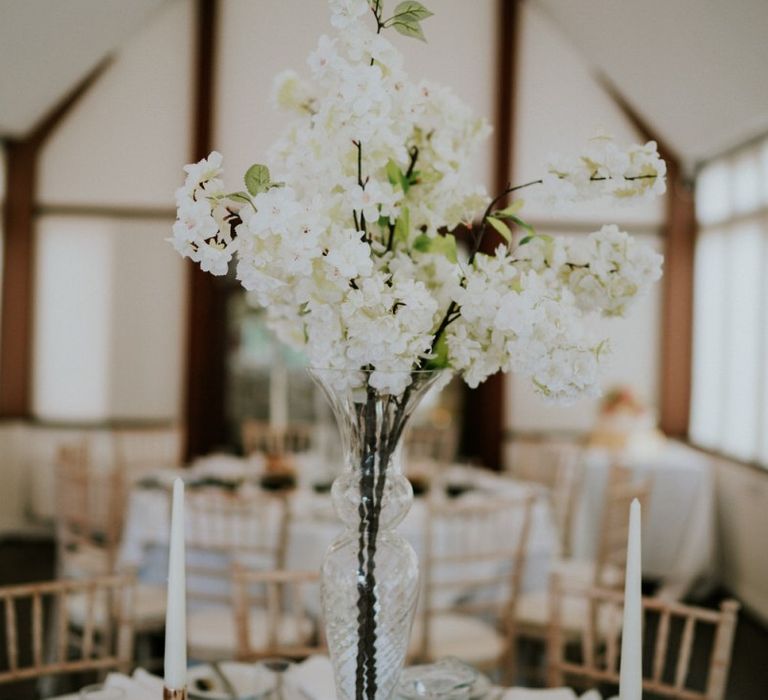 Tall white blossom floral centrepiece