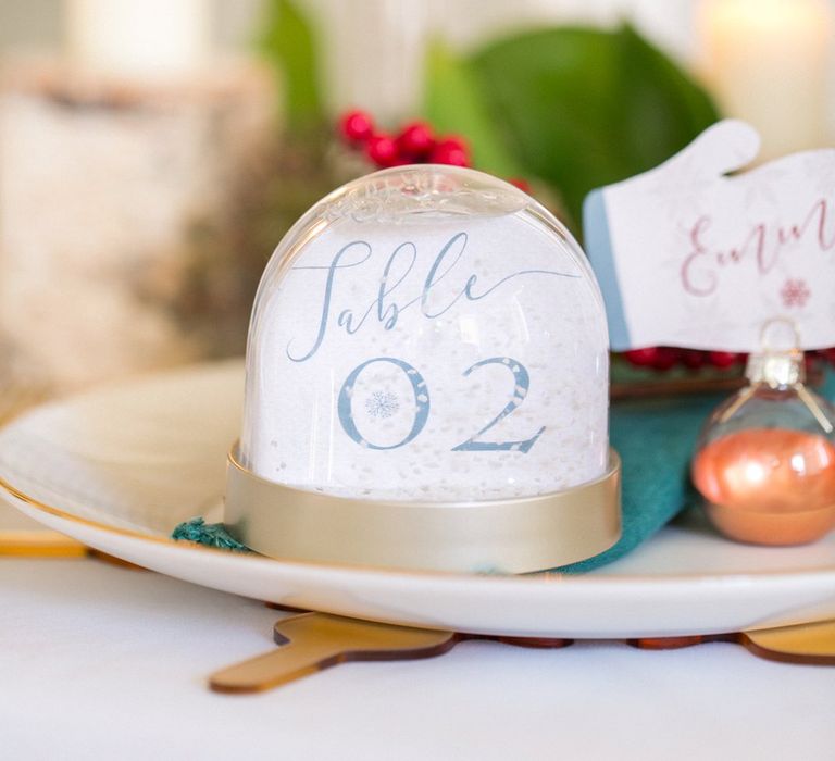 Snow Globe Table Number For Wedding // Gingerbread House For A Festive Christmas Wedding With Red And White Florals Stag Motif Stationery Planned &amp; Styled By La Fete Anneli Marinovich Photography