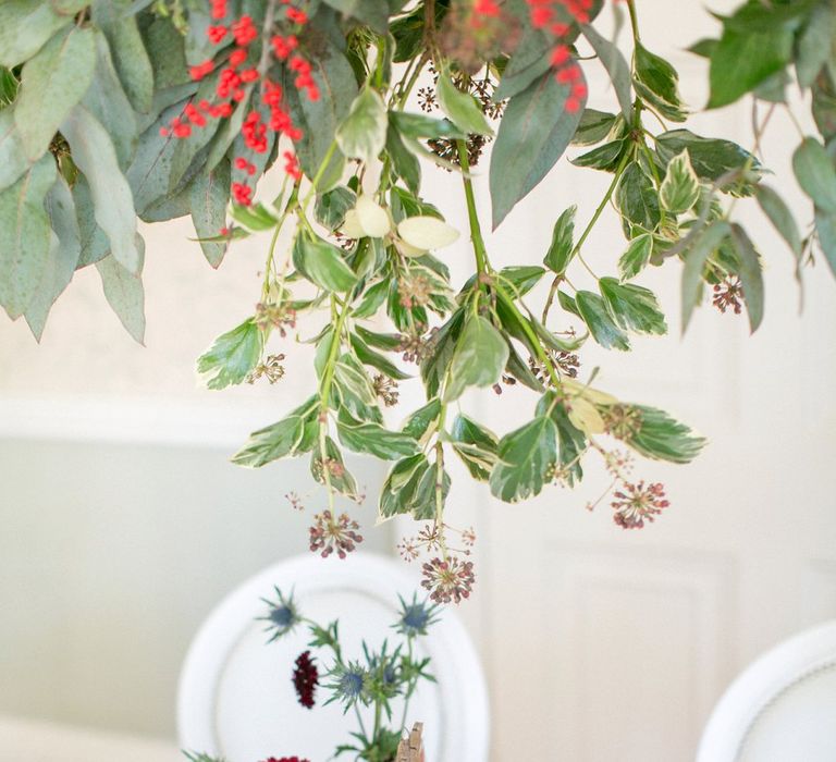 Red Berry Details For Winter Wedding // Gingerbread House For A Festive Christmas Wedding With Red And White Florals Stag Motif Stationery Planned &amp; Styled By La Fete Anneli Marinovich Photography