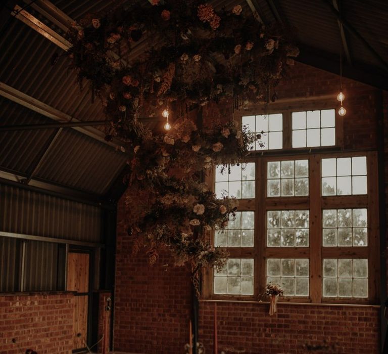 hanging spiral flower installation at the Giraffe Shed