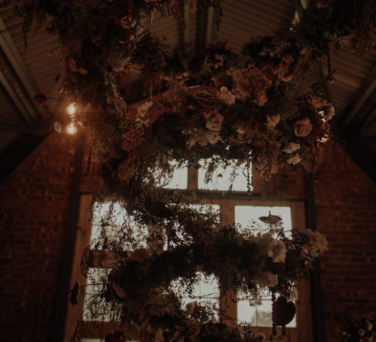 Hanging spiral flower installation at the Giraffe Shed