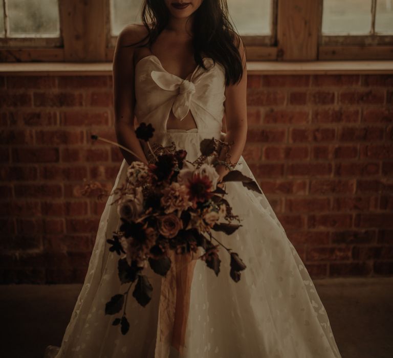 Stylish Asian bride in E&amp;W Couture wedding dress at the Giraffe Shed