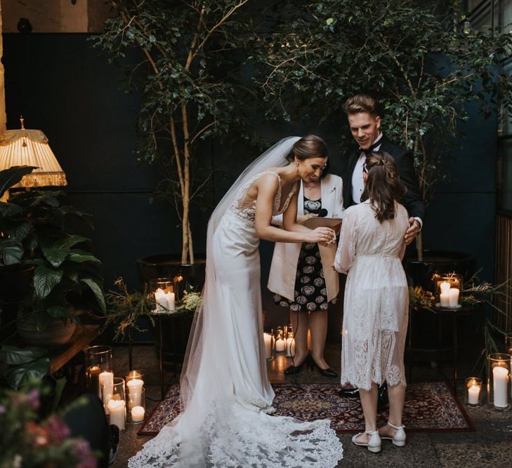 Wedding ceremony candle decor with botanical vibes