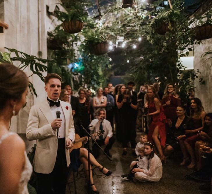 Opera singer groom serenades wife and guests