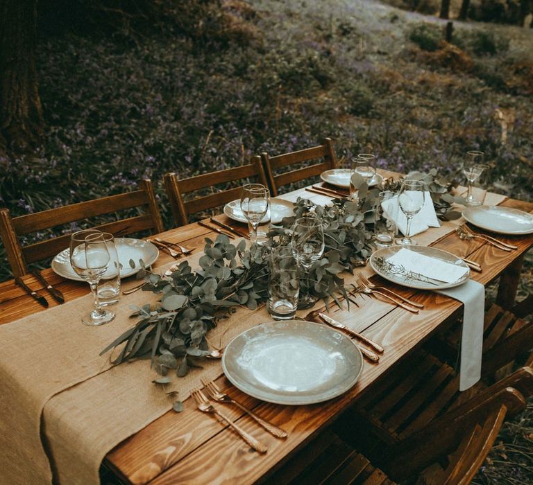 Rustic Tablescape with Wooden Tablescape, Burlap Table Runner and Greenery Centrepiece