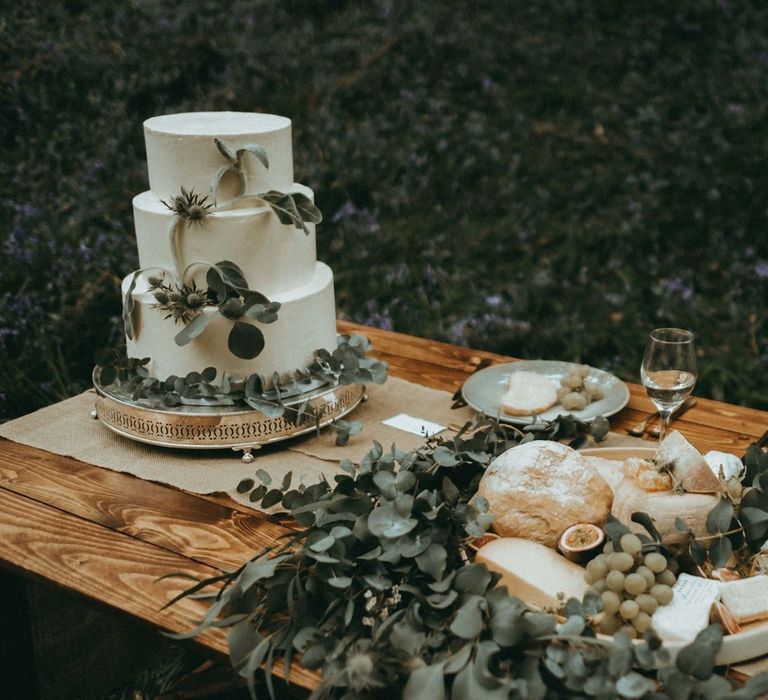 Cheese and Bread Grazing Table and Three Tier White Wedding Cake