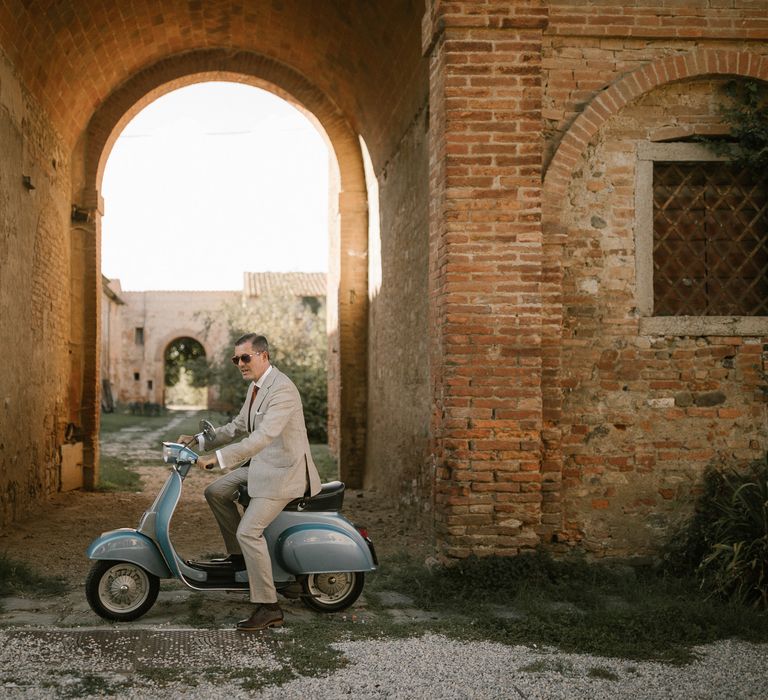 Groom on Scooter | Fairytale Tuscan Wedding with Bride in Embroidered Dress | Andrea &amp; Federica Photography