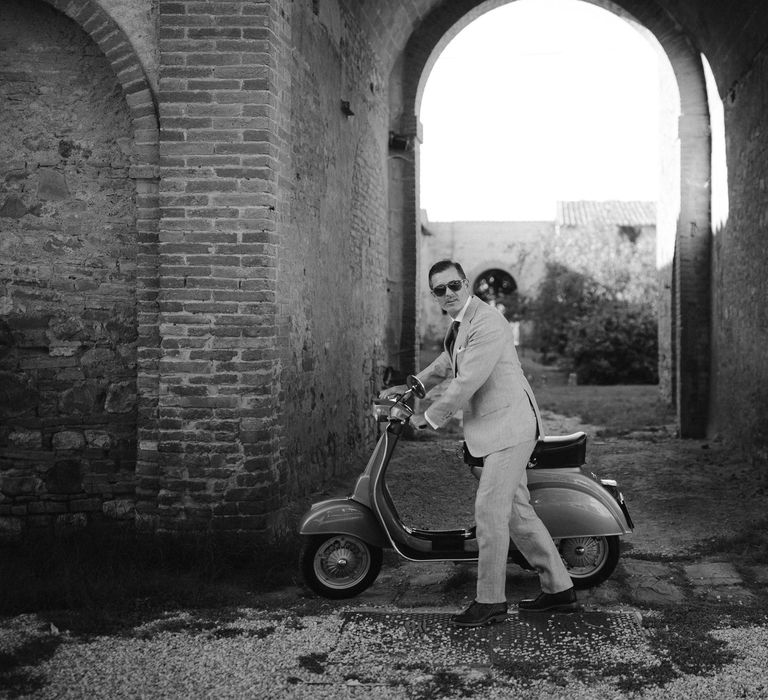 Groom on Scooter | Fairytale Tuscan Wedding with Bride in Embroidered Dress | Andrea &amp; Federica Photography