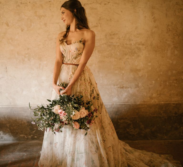 Strapless Embroidered Wedding Dress by Rara Avis | Romantic Bridal Bouquet | Fairytale Tuscan Wedding with Bride in Embroidered Dress | Andrea &amp; Federica Photography