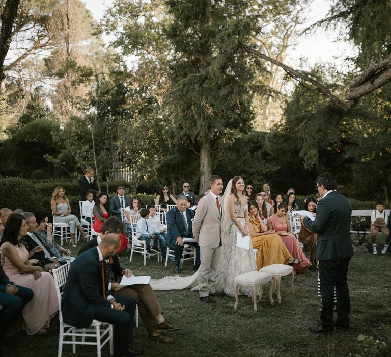 Outdoor Wedding Ceremony | Bride in Strapless Embroidered Wedding Dress by Rara Avis | Groom in Beige Suit with Ochre Tie | Fairytale Tuscan Wedding with Bride in Embroidered Dress | Andrea &amp; Federica Photography