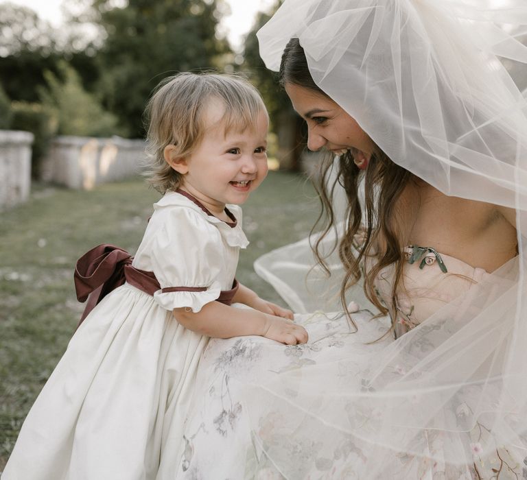 Bride in Strapless Embroidered Wedding Dress by Rara Avis | Flower Girl in White Dress | Fairytale Tuscan Wedding with Bride in Embroidered Dress | Andrea &amp; Federica Photography