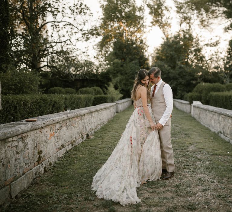 Bride in Strapless Embroidered Wedding Dress by Rara Avis | Groom in Beige Suit with Ochre Tie | Fairytale Tuscan Wedding with Bride in Embroidered Dress | Andrea &amp; Federica Photography