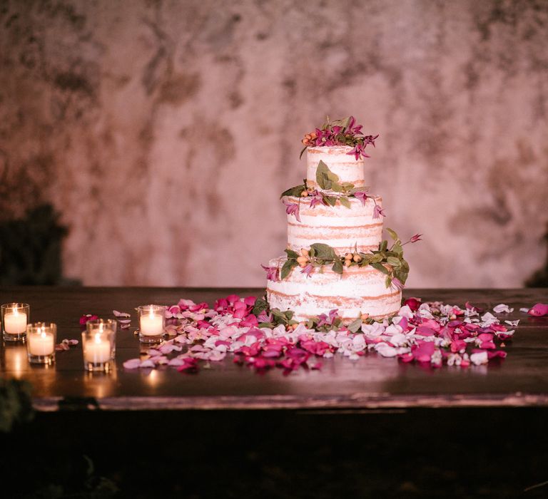 Naked Wedding Cake | Pink Petals | Tea Lights | Fairytale Tuscan Wedding with Bride in Embroidered Dress | Andrea &amp; Federica Photography