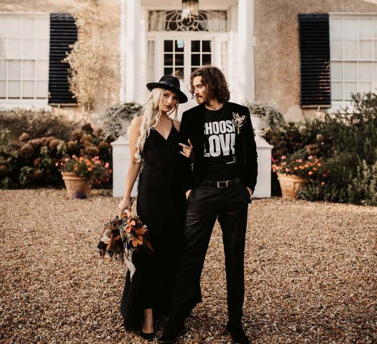 Stylish bride and groom outside Preston court for Halloween wedding  shoot