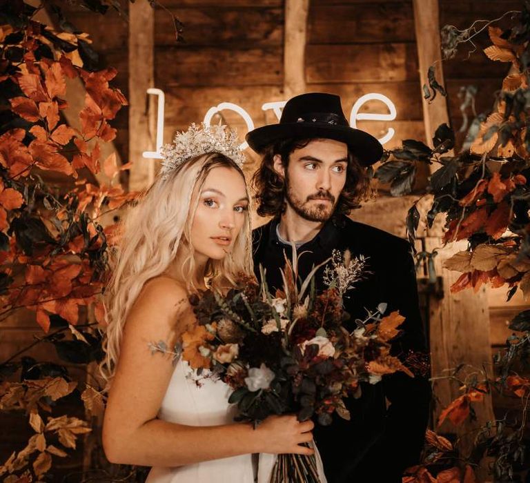 Bridal crown and groom in hat for Halloween wedding at Preston Court