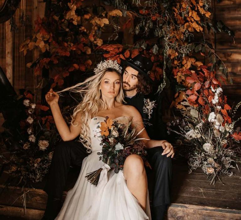 Stylish bride and groom at Halloween wedding