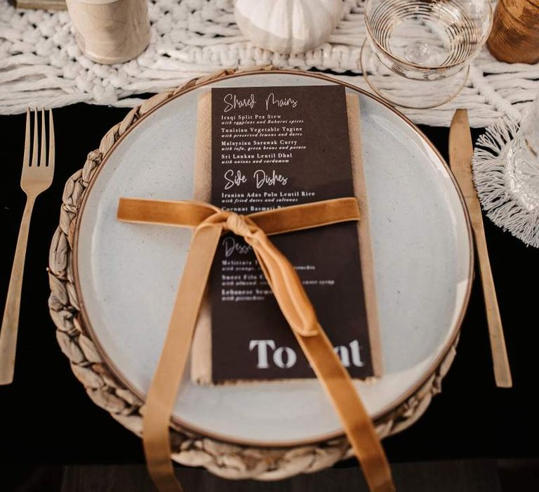 Place setting in Autumn wedding colours for Halloween wedding