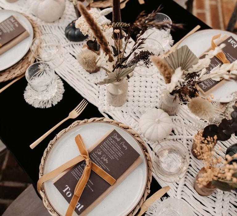 Macrame table runner, white pumpkins and dried flowers for Halloween wedding