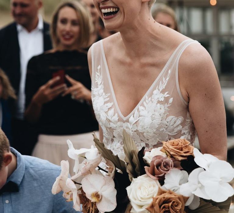 Smiley Bride with Short Hair in Made With Love Wedding Dress