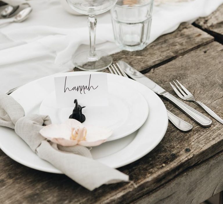 Place Setting with White Place, and Linen Napkin