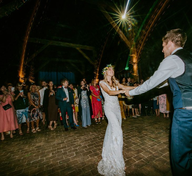 First Dance with Bride in Lace Watters Wedding Dress and Flower Crown and Groom in Navy Hugo Boss Suit