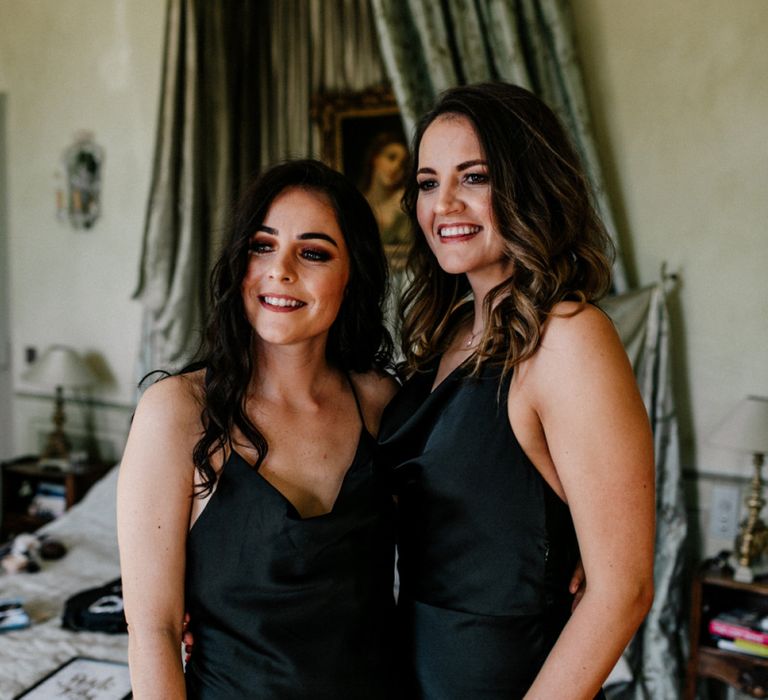 Bridesmaids in Black Satin Dresses