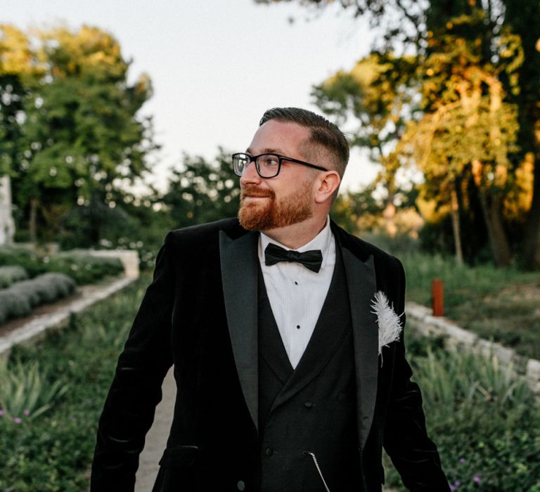 Groom in Tailor Made Tuxedo with Bow Tie