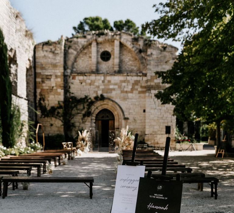 Outdoor French Wedding Ceremony with Stylish Monochrome Wedding Signs