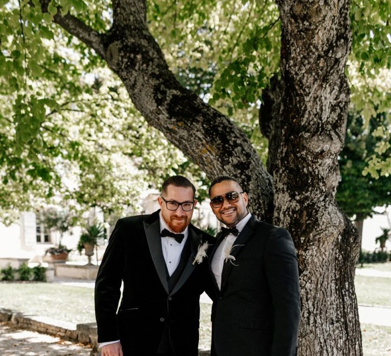 Groom and Best Man in Black Tie Suits