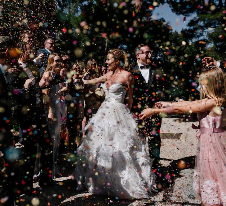 Colourful Confetti Moment with Bride and Groom Celebrating