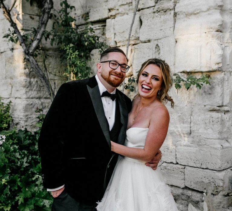 Stylish Bride and Groom in Black Tie Attire Embracing