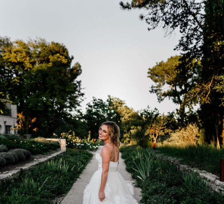 Bride in Feather Wedding Dress by Stephanie Allin