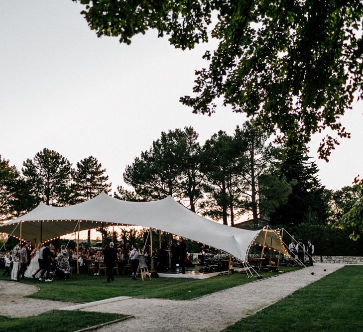 Stretch Tent Outdoor Reception with Festoon Lights