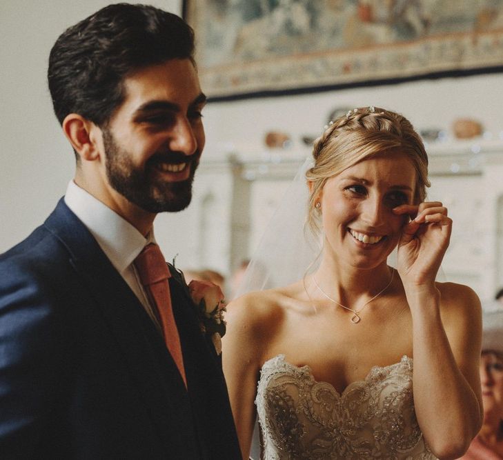 Bride Wipes Away Happy Tears During Ceremony