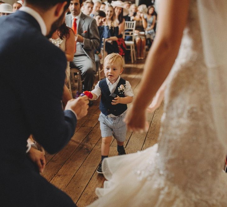 Kids At Weddings Page Boy Brings Rings with Bride In Mermaid Wedding Dress