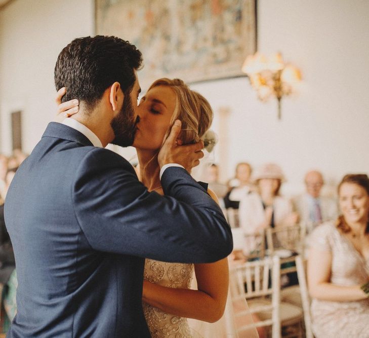 Bride and Groom Kiss As Husband and Wife