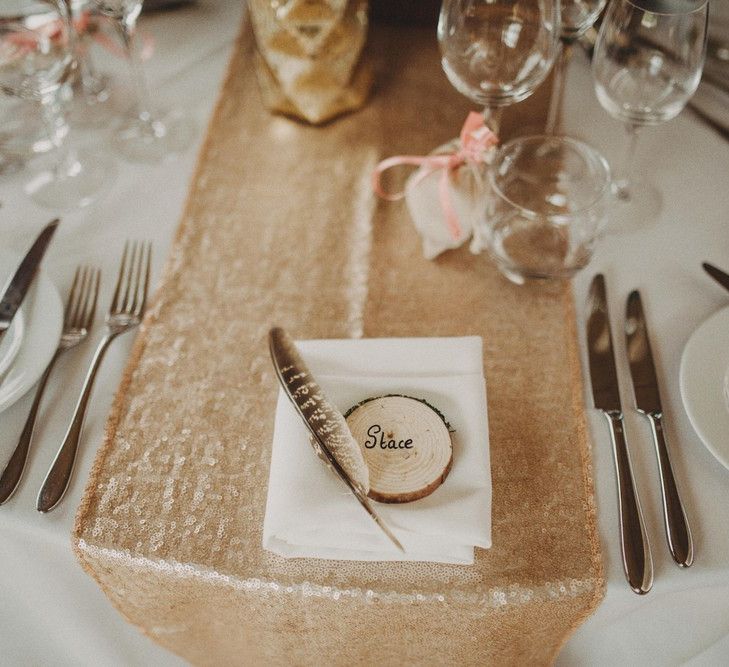 Wedding Place Setting With Tree Slice Name Place and Feather Decor