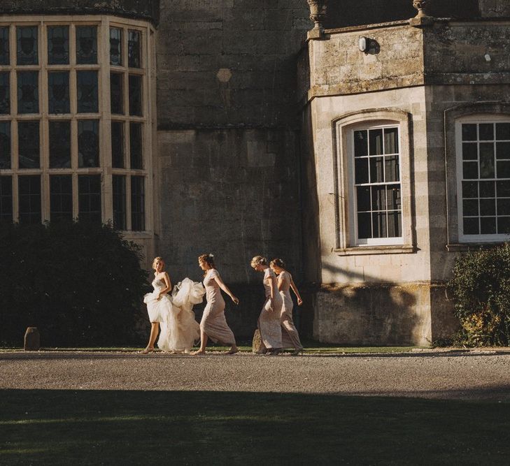 Bridal Party Walk In Front Of Elmore Court